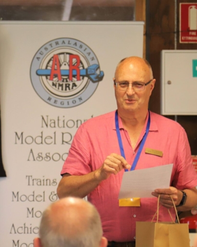 Randall giving sponsors a plug